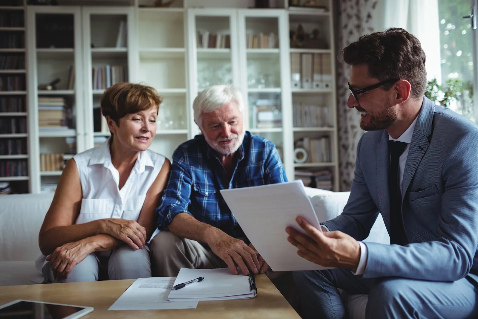 Homeowner reviewing policy with agent